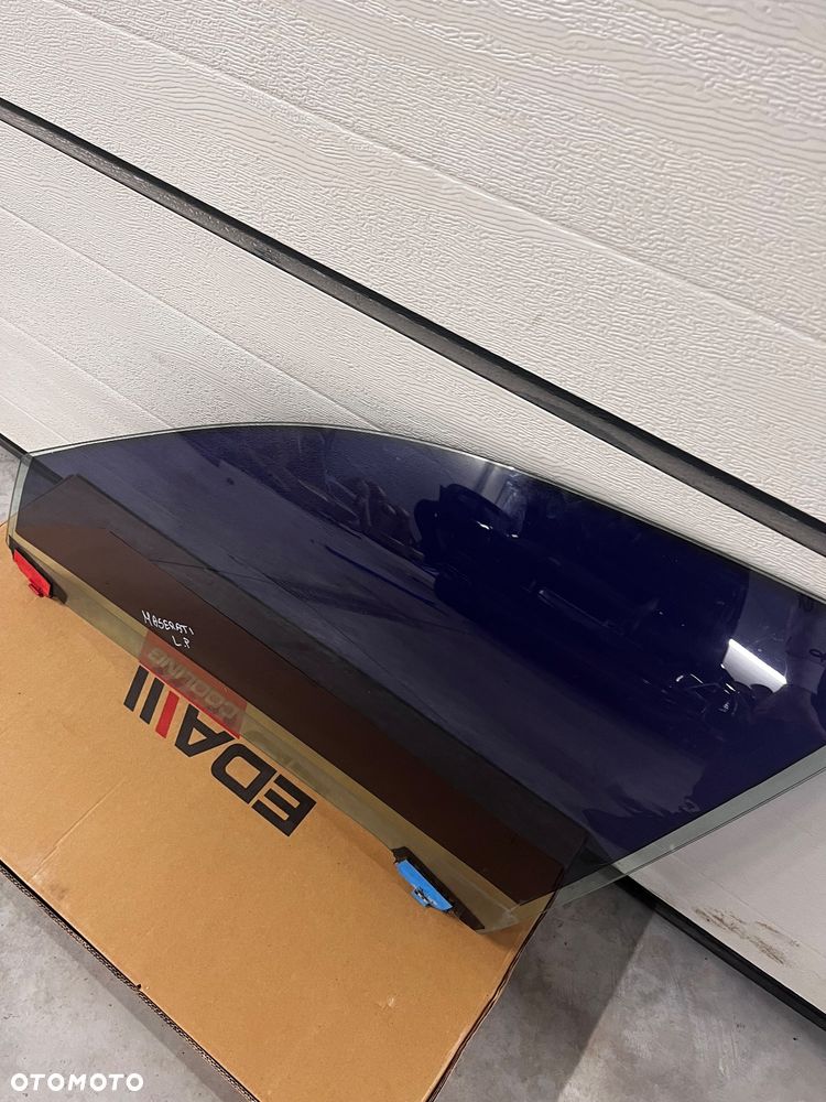 Szyba lewa przednich drzwi Maserati Quatrporte 2009/12 - 2