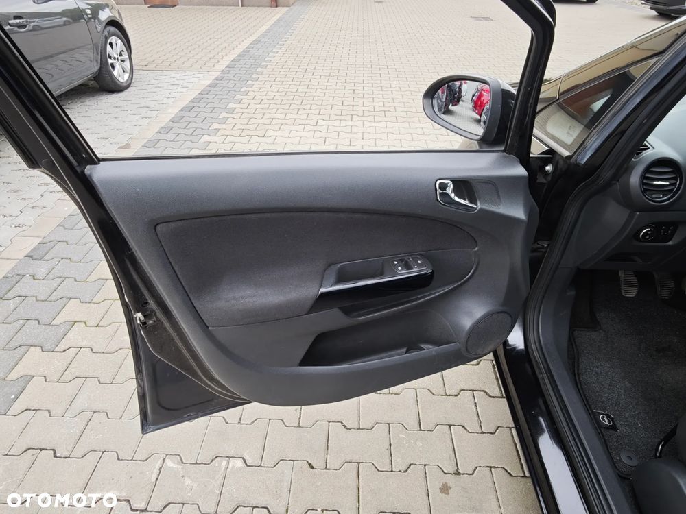 Opel Corsa 1.4 16V Satellite - 24