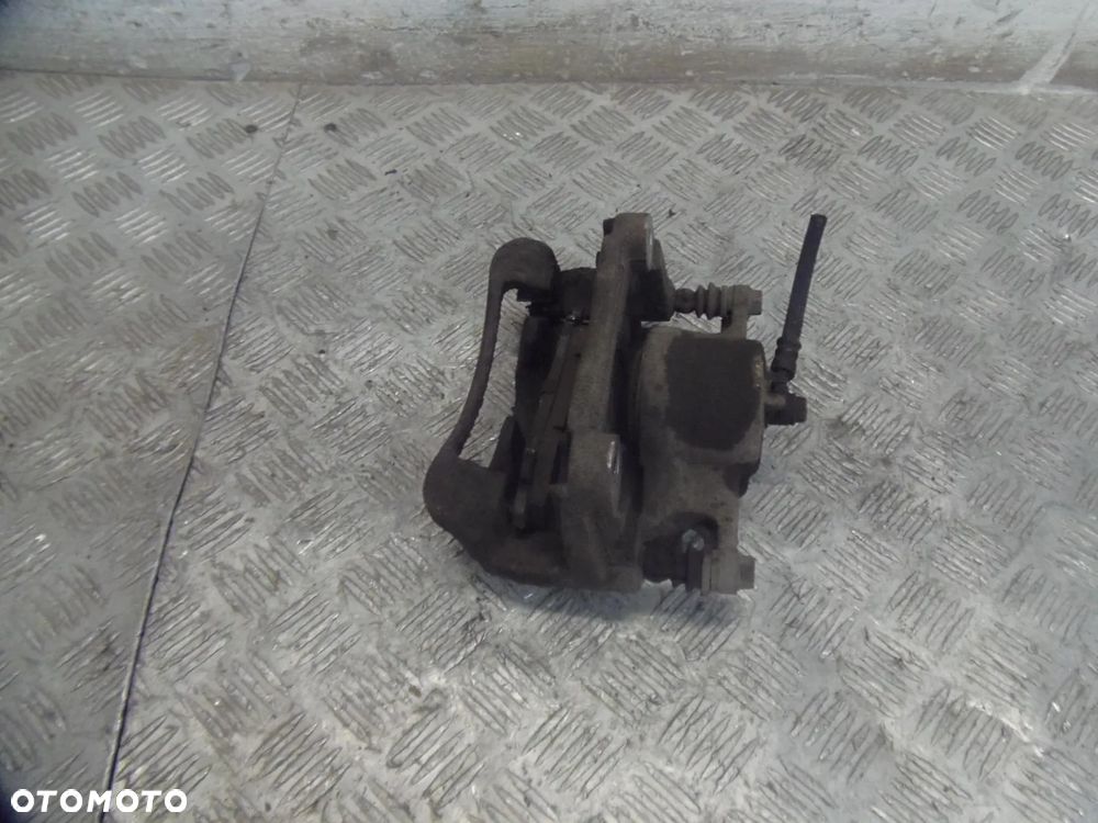 NISSAN QASHQAI J10 LIFT 1.6B 012R ZACISK HAMULCOWY LEWY PRZEDNI PRZÓD - 3