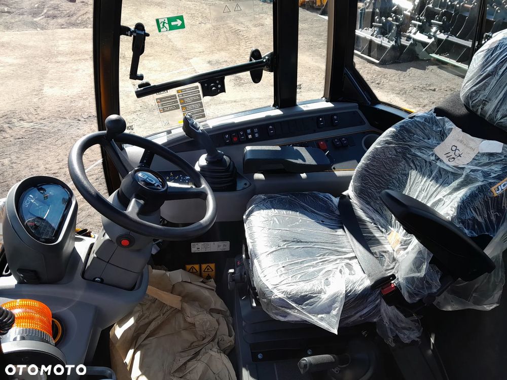 JCB 409 - 23