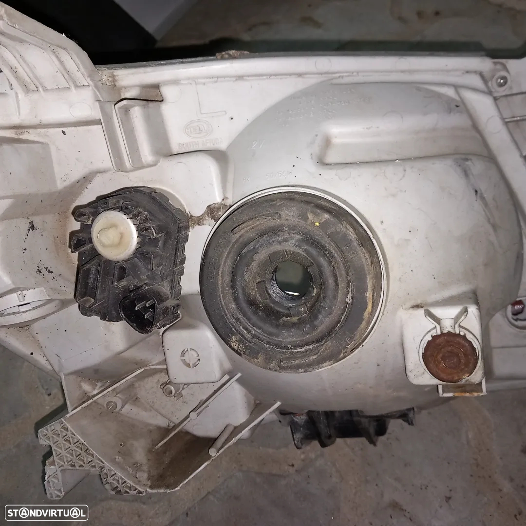 Farol condutor toyota hylux ano 2006 - 2