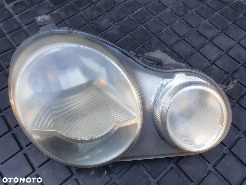 Volkswagen Polo III 6N 6N2 6NF Lampa przednia 20A385 TYC - 1