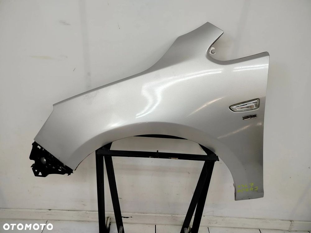 OPEL ASTRA J 09R- BŁOTNIK LEWY PRZÓD PRZEDNI Z176 - 1