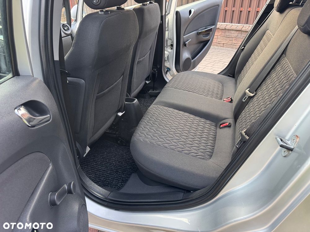 Opel Corsa 1.2 16V Enjoy - 11