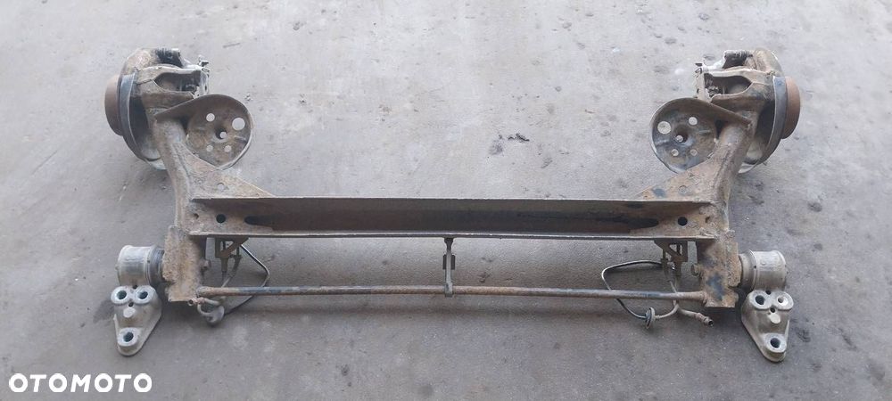 BELKA OŚ ZAWIESZENIA TYŁ TARCZE Z ABS HAMULCE ZACISKI SKODA SUPERB I - 6