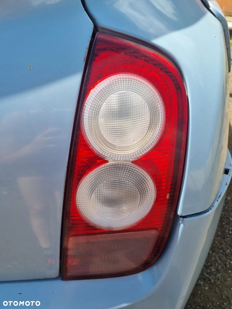 NISSAN MICRA III K12 03-07 2005 r. 5D HB lampa prawy tył prawa PT EU * - 1
