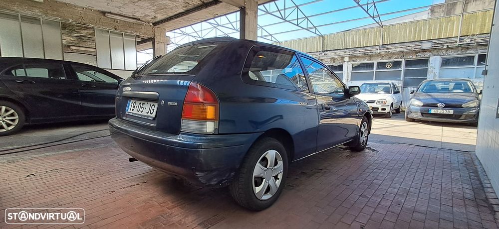 Mazda 323 - 12