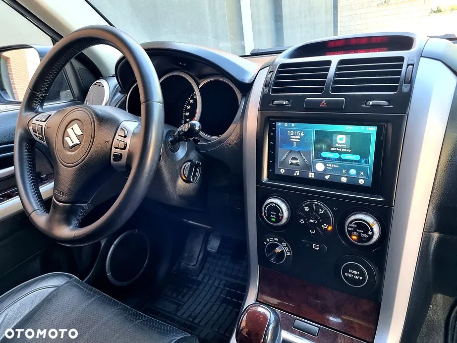 Suzuki Grand Vitara 2.0 Comfort + - 9