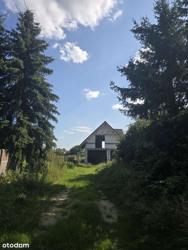 Dom stan surowy, wolnostojący z garażem, duża działka