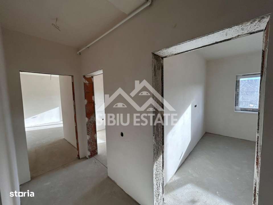 Apartament modern decomandat cu 2 camere si balcon in Șelimbar - Imagine principală: 5/6
