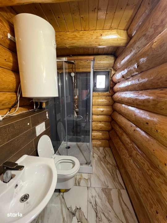 Doua cabane din bustean rotund, 120mp, 1200mp teren, zona Balcesti - Imagine principală: 3/15