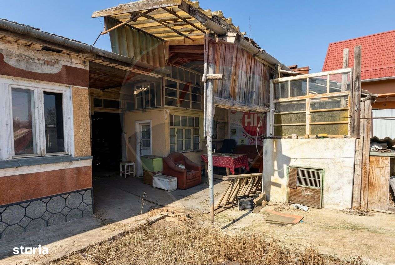 Casă cu teren generos la colț de intersecție - cartier Poiana-11