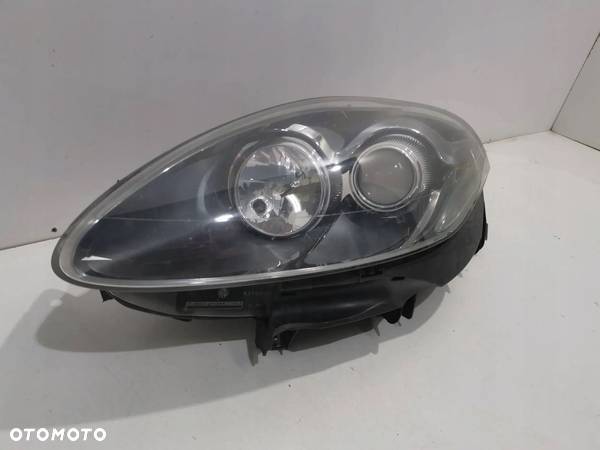 LAMPA REFLEKTOR LEWY FIAT BRAVO II LIFT EUROPA ŁADNA CAŁA - 1