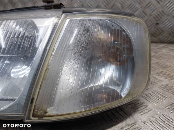 LAMPA LEWY PRZÓD + PRAWY PRZÓD HELLA AUDI A3 8L - 9