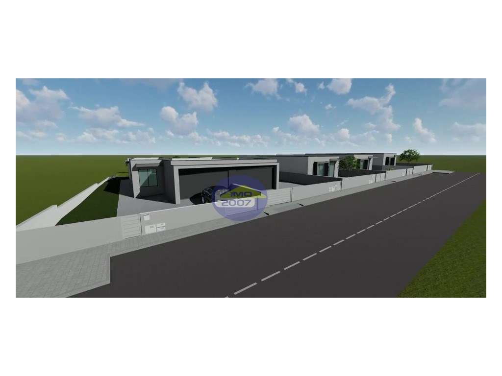 Moradia T3 térrea com pátio, jardim e garagem fechada para dois carros - Grande imagem: 4/23