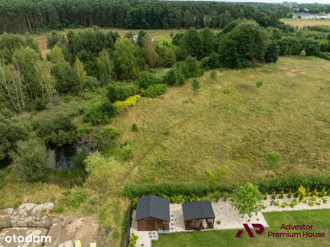 Działka tuż przy lesie w willowym otoczeniu-16