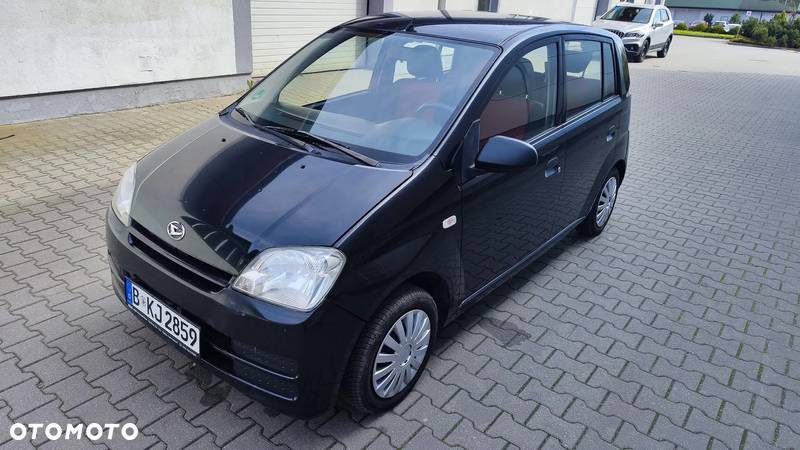 Daihatsu Cuore 1.0 Plus - 1