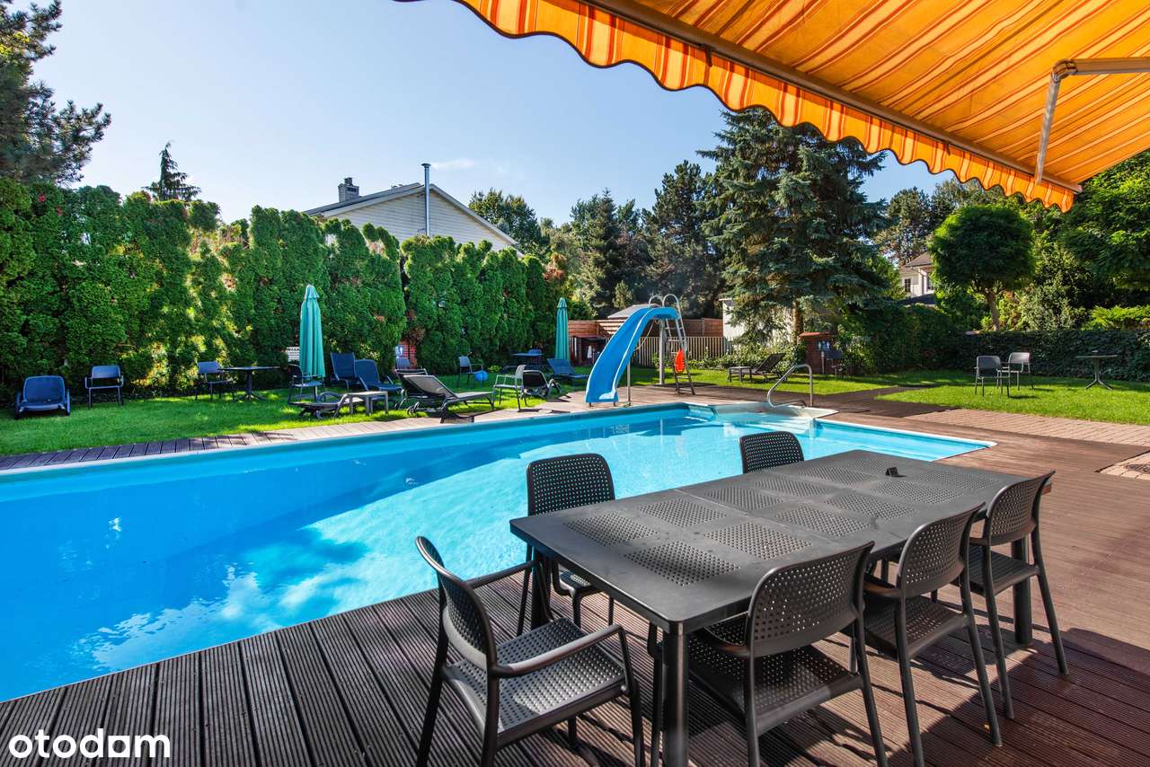 Dom z dużym ogrodem na osiedlu Zielonym-0