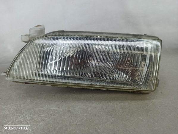 Optica Farol Esquerda Esq Toyota Corolla Liftback (_E10_) - 1