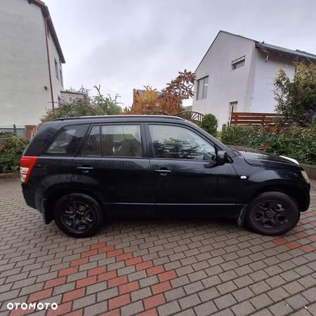 Suzuki Grand Vitara 2.0 - 9