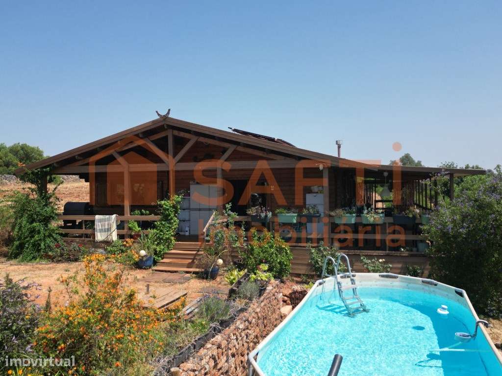 Terreno com casa de madeira e ruína em Algoz - Grande imagem: 5/52