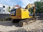 Caterpillar 323 E - 7