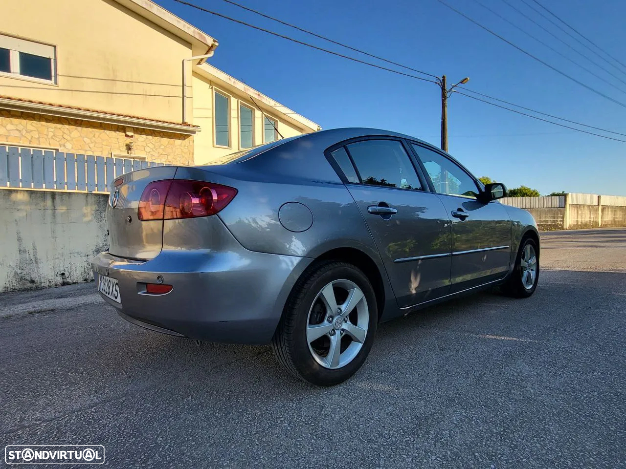 Mazda 3 MZR 1.6 Exclusive - 12