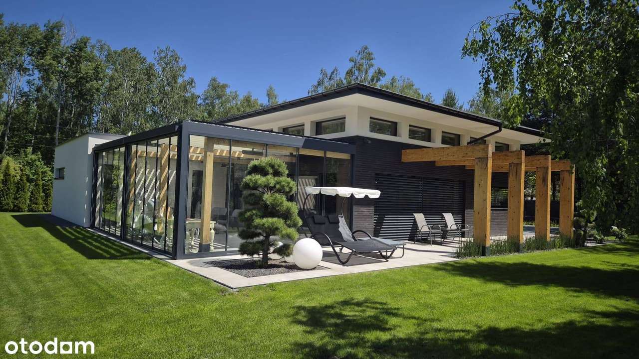 Nowoczesny dom 4 pok. z garażem w spokojnej okolicy-2