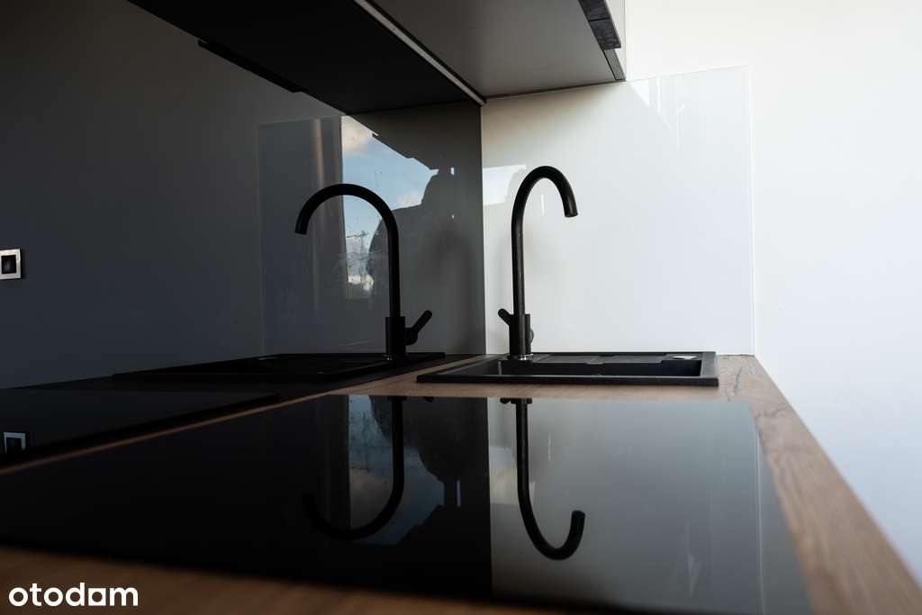 Nowoczesna kawalerka z widokowym balkonem-15