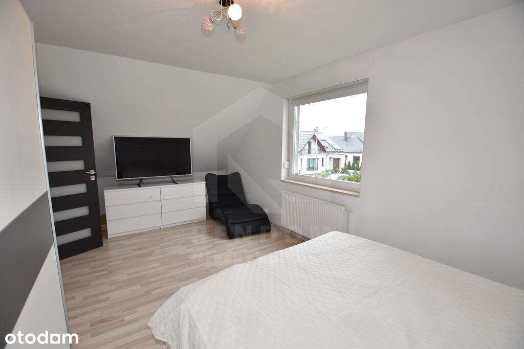 Dom z garażem i fotowoltaiką – Narok-13