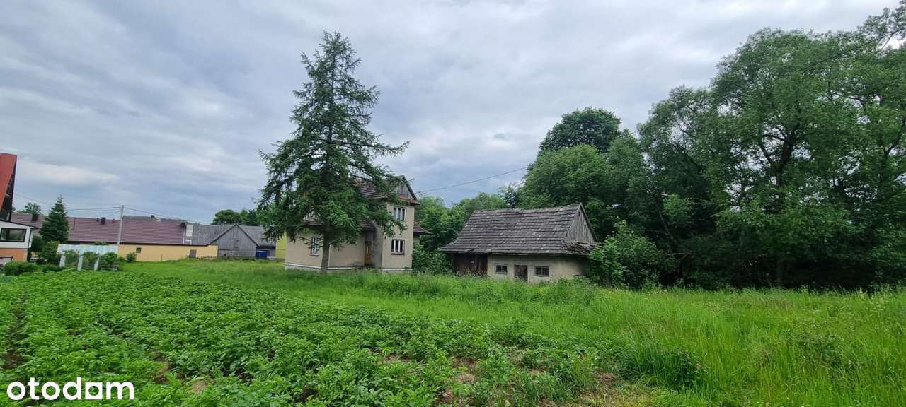 Dom w pięknej lokalizacji z działką budowlaną