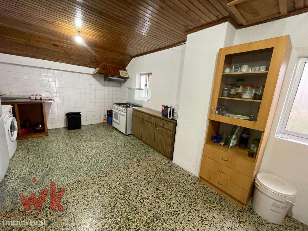 Casa dividida em 3 apartamentos com garagem-15