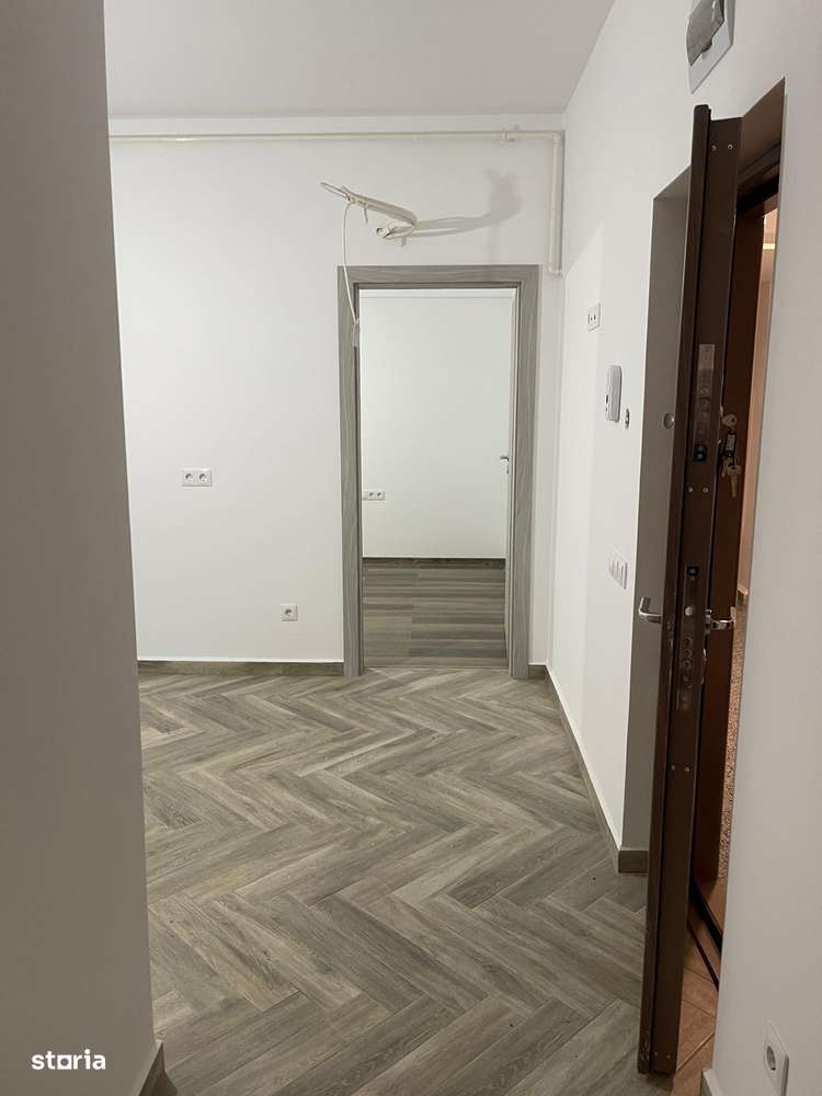 Apartament 2 cam dec, bucatarie separata etaj 1 cu parcare subterana-4