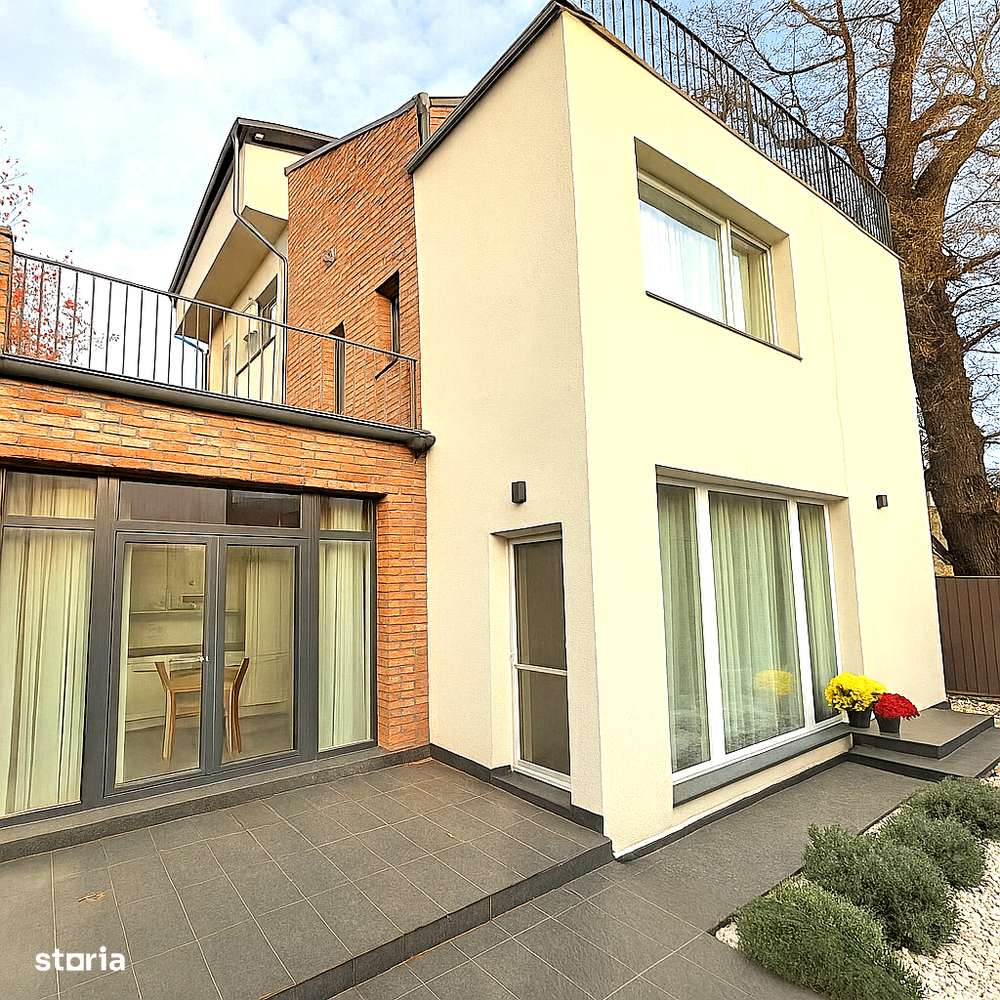 Casa moderna, 2025, cu terase generoase si arhitectura premium-0