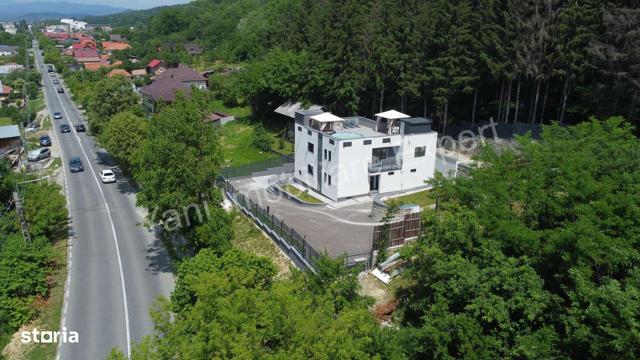 Casă de vânzare în Curtea de Argeș. - Imagine principală: 3/20