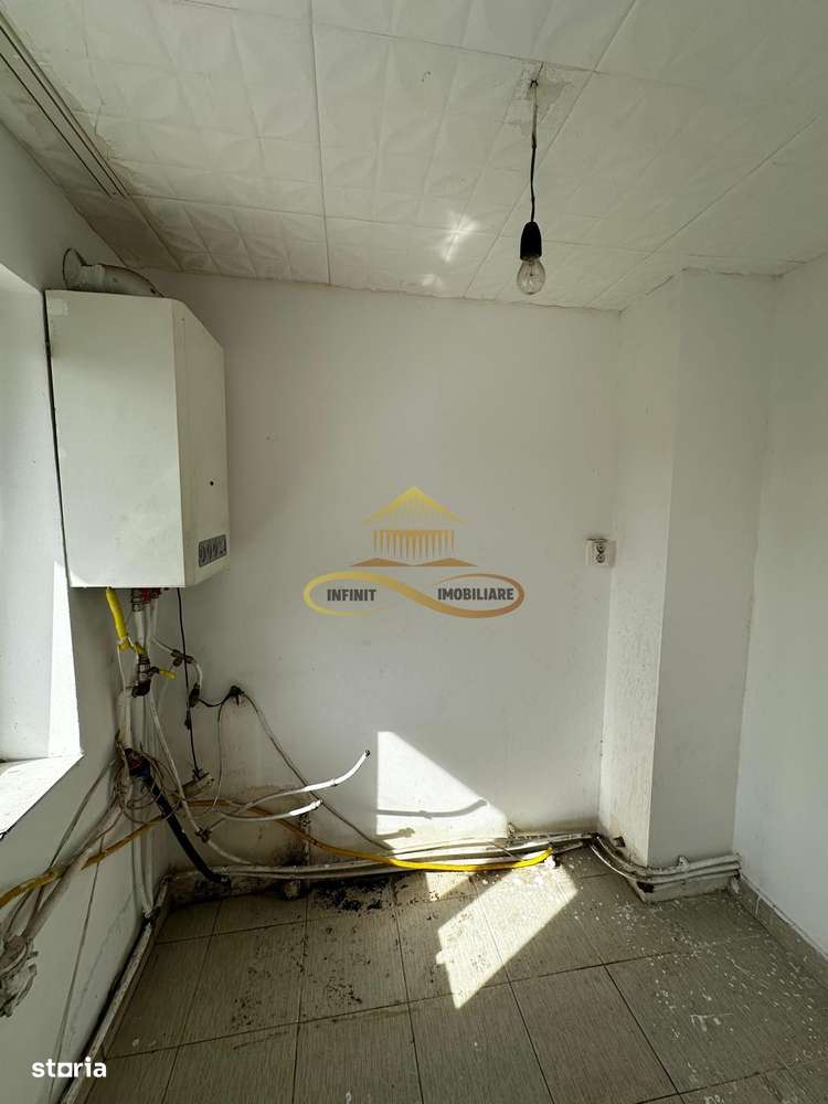 Casa batraneasca cu 800 mp teren de vanzare in Tache / Bacau-6