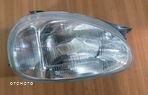 Opel Corsa Reflektor Prawy 555510-V - 1