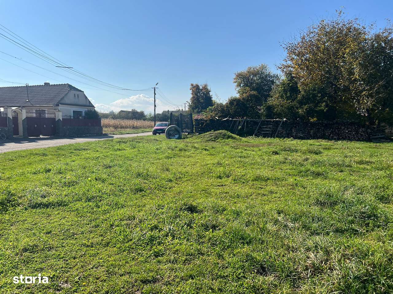 Teren intre case,la asfalt,curent,canalizare,apa,iluminat stradal.-2