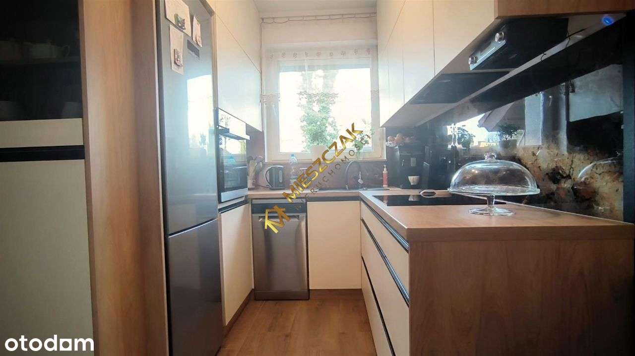 Częśc domu z ogrodem i dwoma lokalami użytkowymi w-9