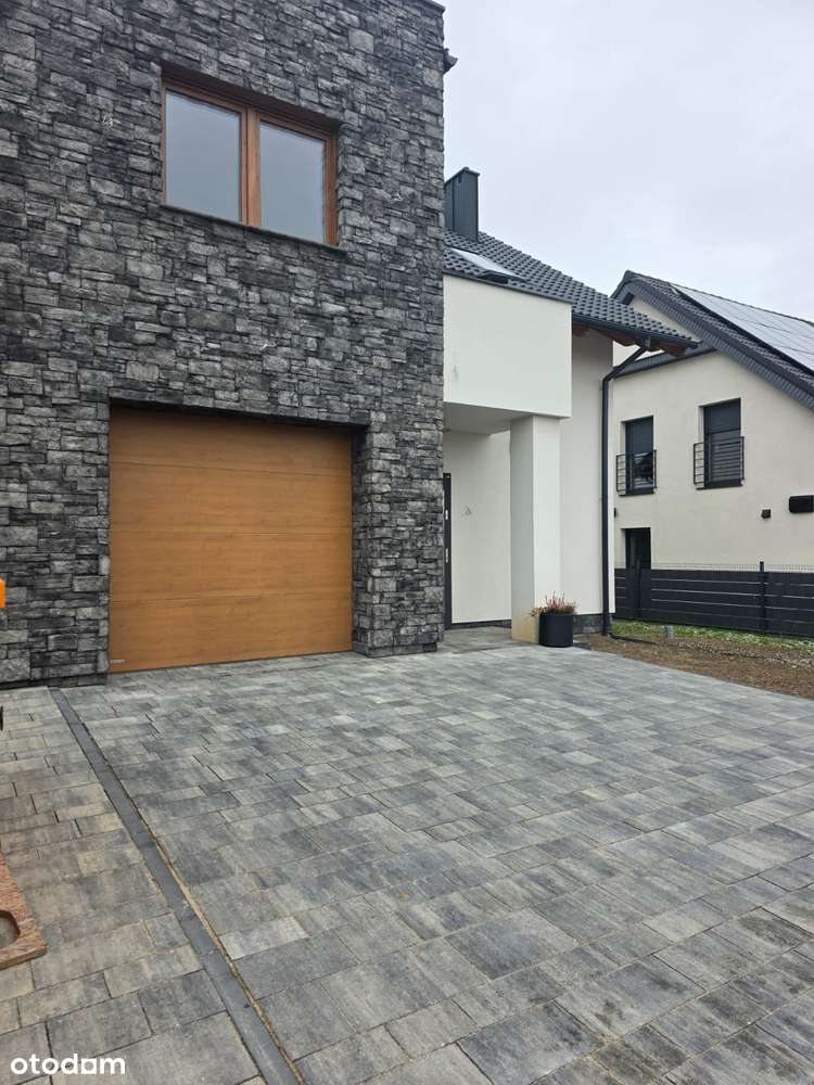 Wysoki standard/4 pokoje/garaż/balkon/taras/2 garderoby-1