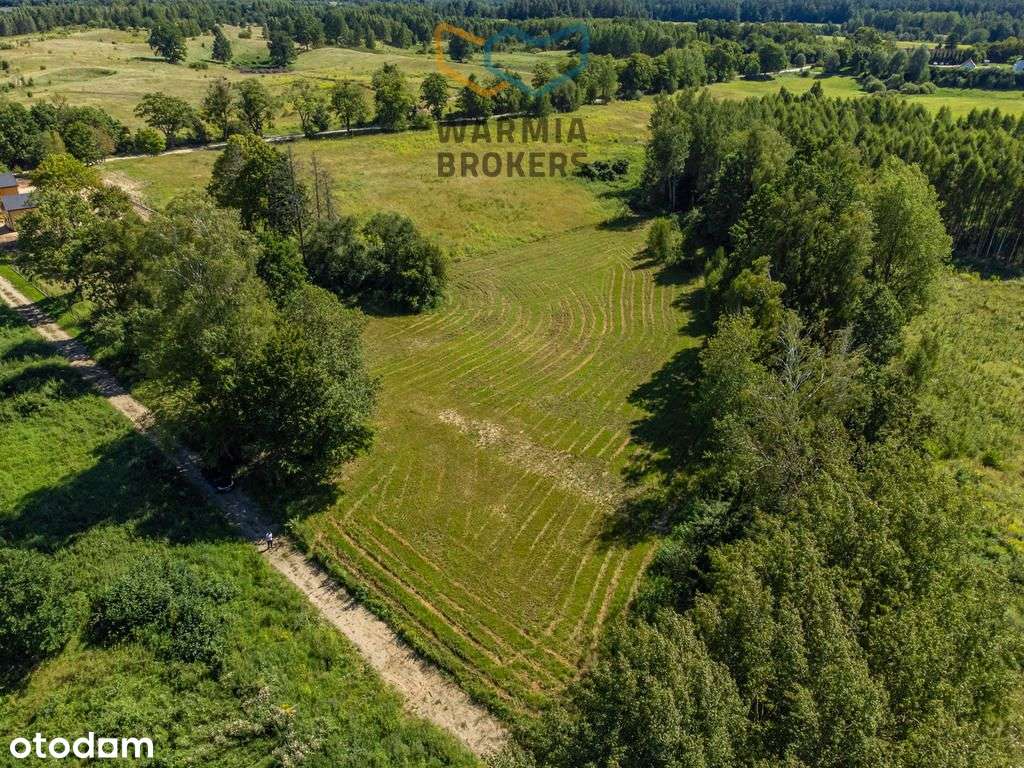 Działka budowlana nad jeziorem z dostępem do plaży-14