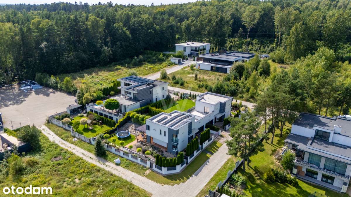 Nowoczesny bliźniak z pięknym ogrodem-19