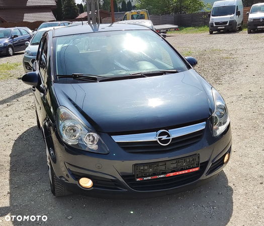 Opel Corsa 1.2 16V Enjoy - 24