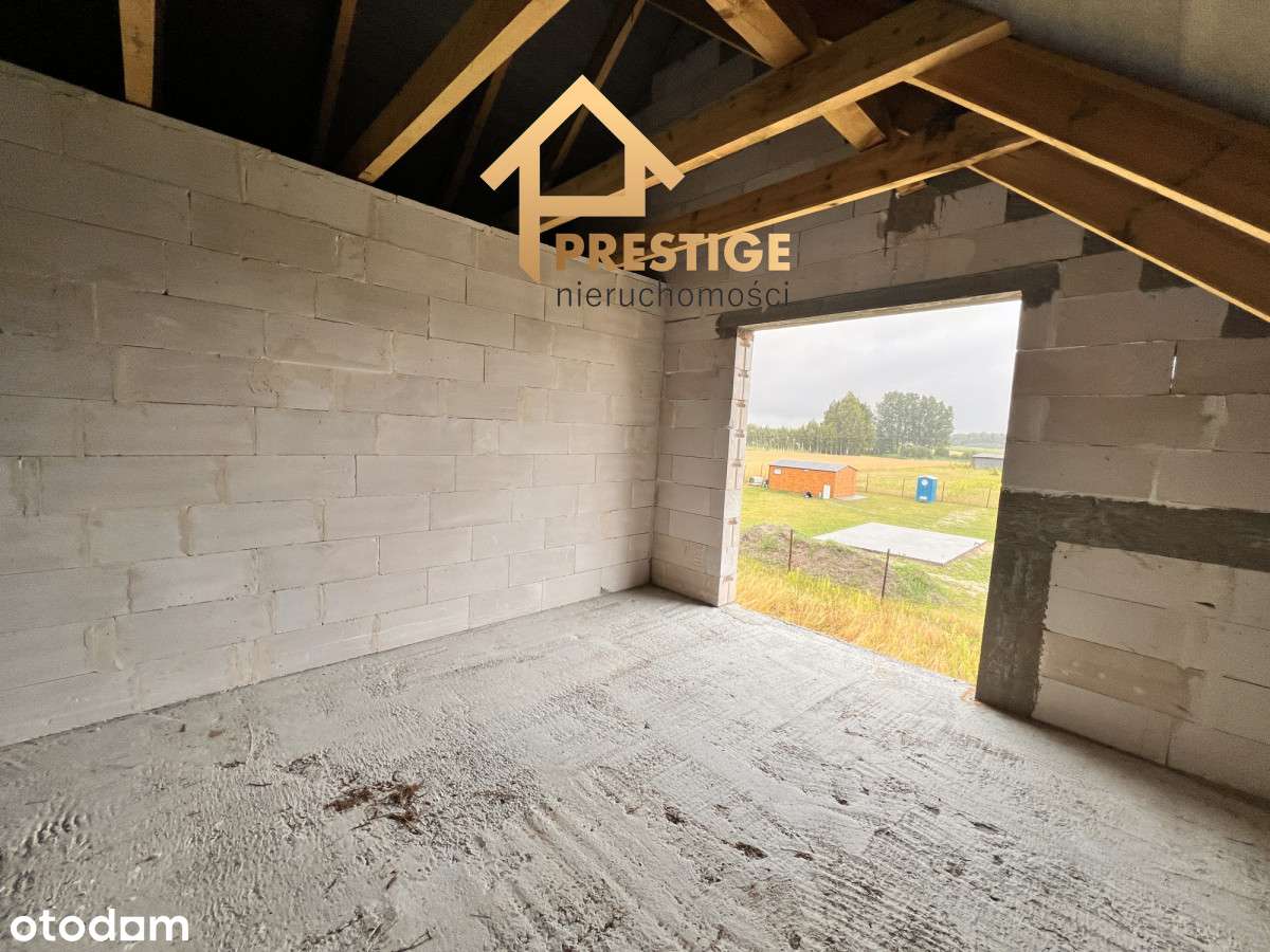 Dom w stanie surowym otwartym blisko jeziora.-8