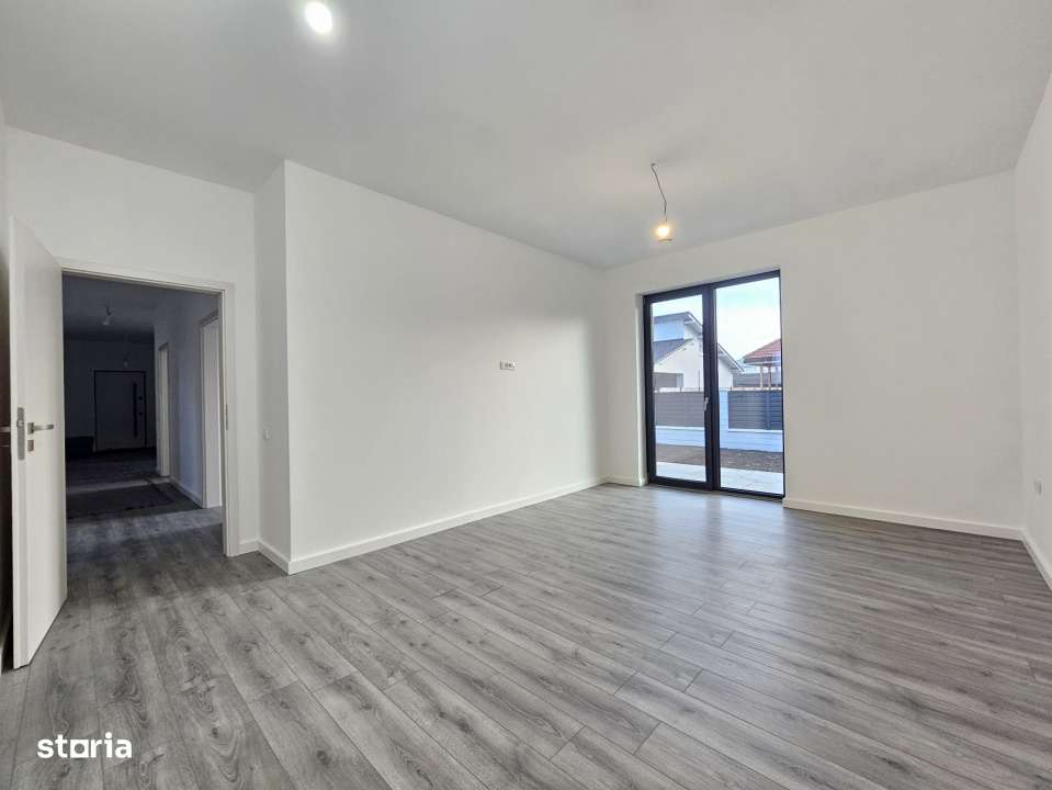 Casa individuala cu patru camere NZEB, teren 600mp, Halchiu-1