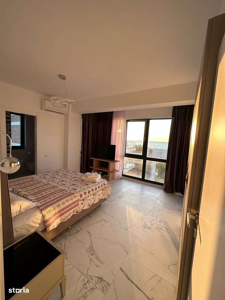 De închiriat 3 camere, vedere la mare Mamaia zona Barrels 800eur - Imagine principală: 5/8