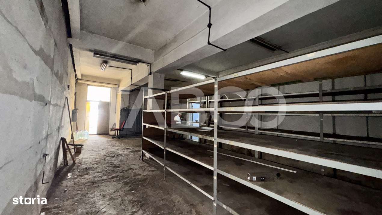 Spatiu pentru depozitare magazinare de inchiriat cu birou 102mpu Sibiu - Imagine principală: 1/3