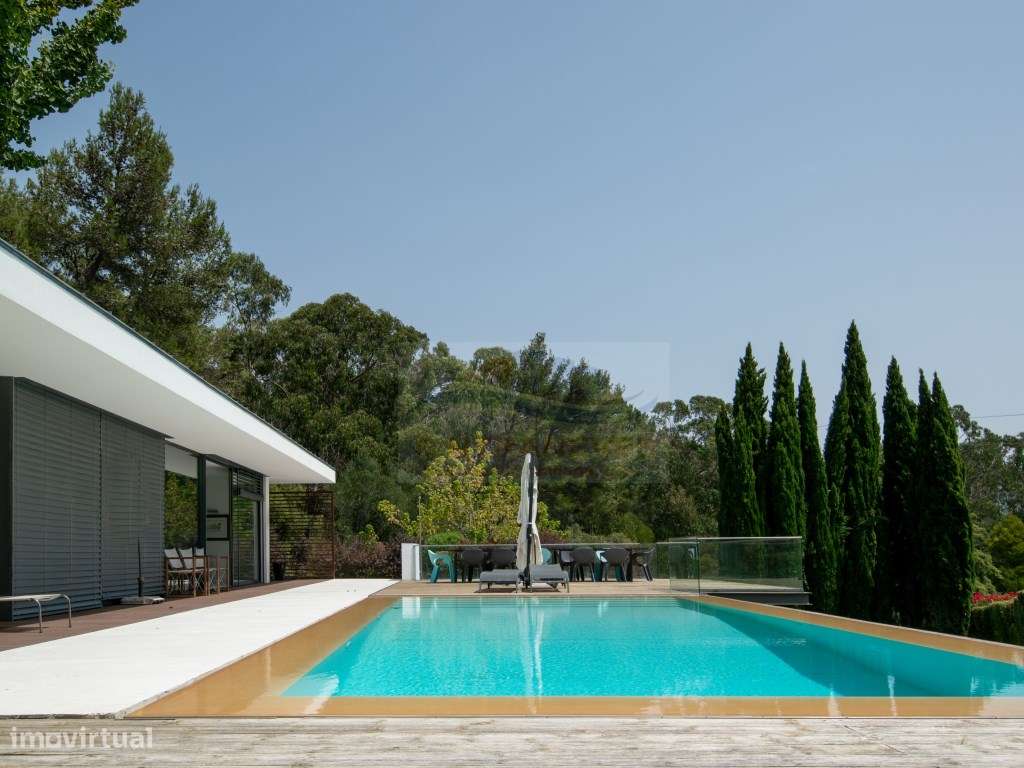 Moradia térrea Contemporânea com 600m2 de área bruta implantada em ...-10