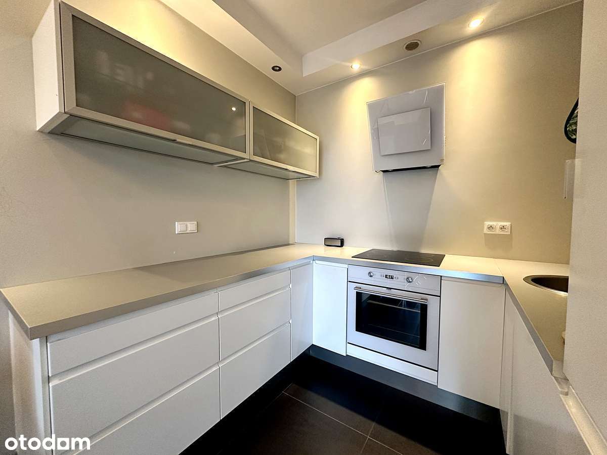 Segment bezczynszowy dwupoziomowy z użytkowym poddaszem i ogrodem-4