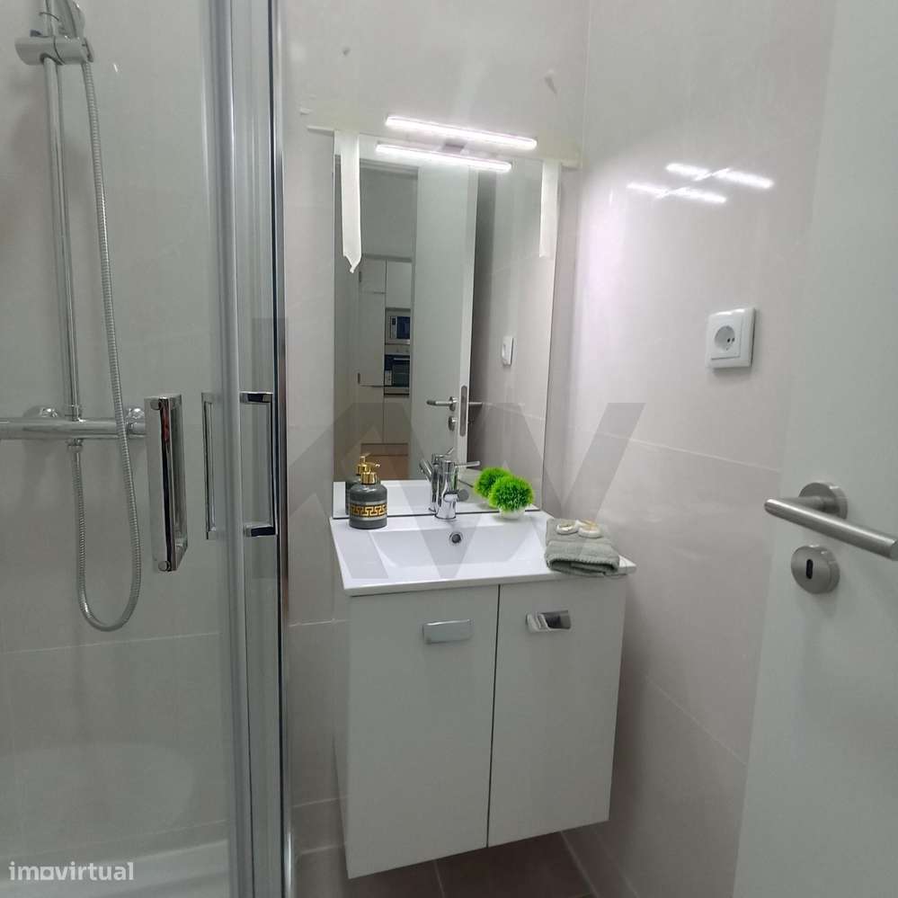 Apartamento com Vista Deslumbrante do Rio | Espaçoso e Moderno - Grande imagem: 4/9